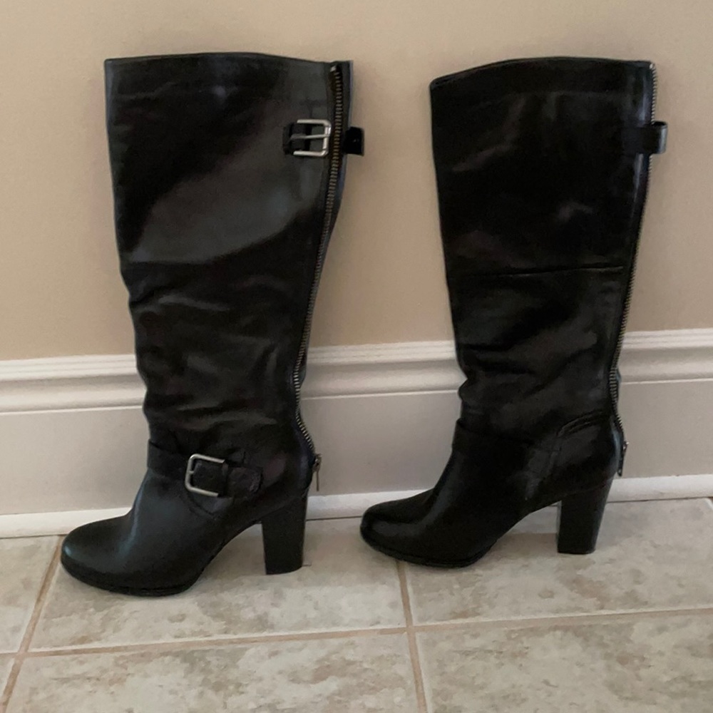 Genuine leather black knee high boots.